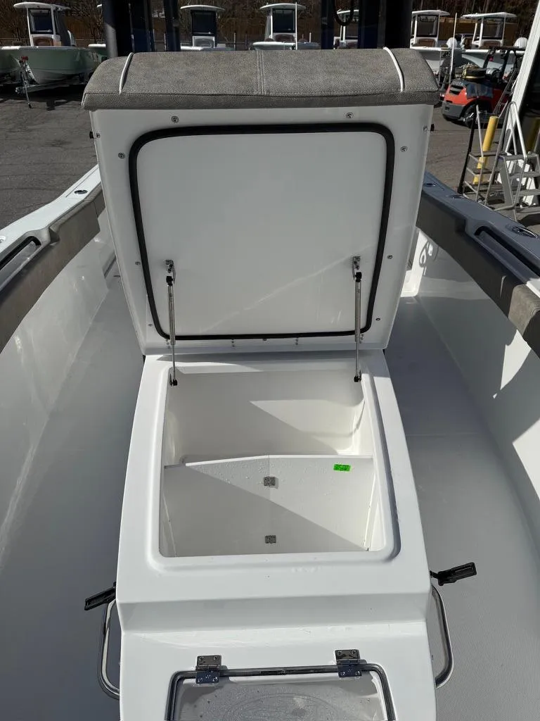 Slide: The Image of 2025 Sea Hunt Gamefish 28 with open coffin box, showcasing spacious storage. - 6