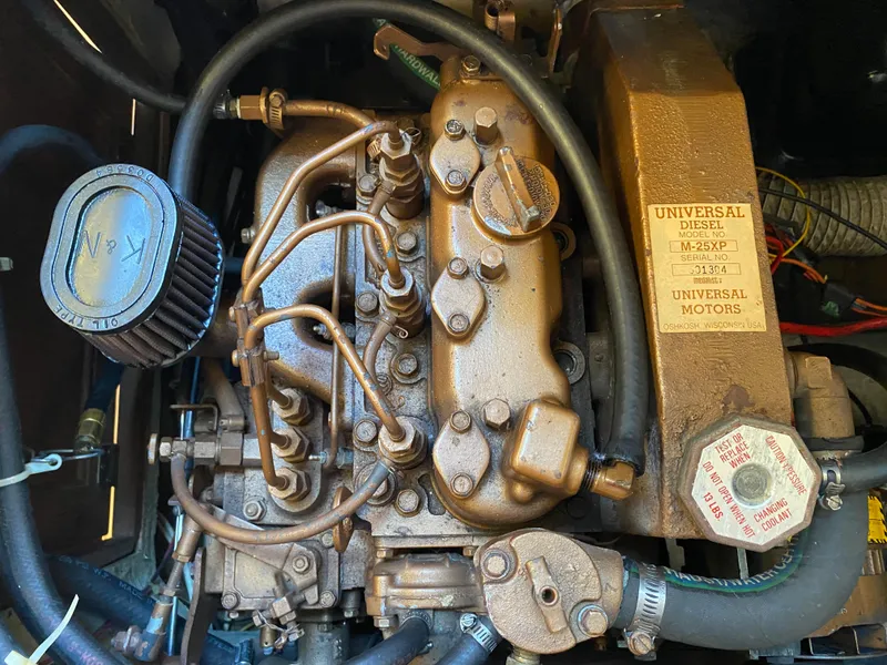 Slide: The Image of Universal diesel engine in a 1988 Catalina 30 sailboat. - 25