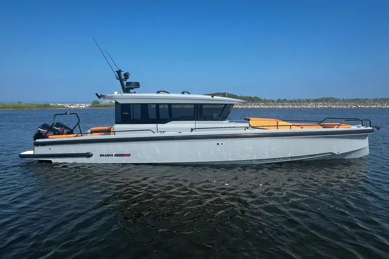 The Image of 2024 BRABUS Shadow 900 XC Cross Cabin boat on calm water, side view. - 0