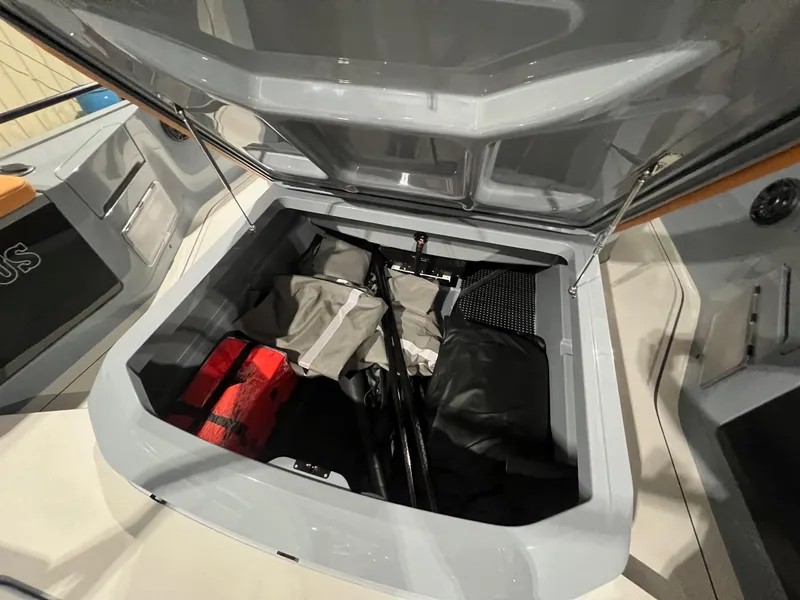 Slide: The Image of 2024 BRABUS Shadow 900 XC Cross Cabin storage compartment with gear and equipment. - 14
