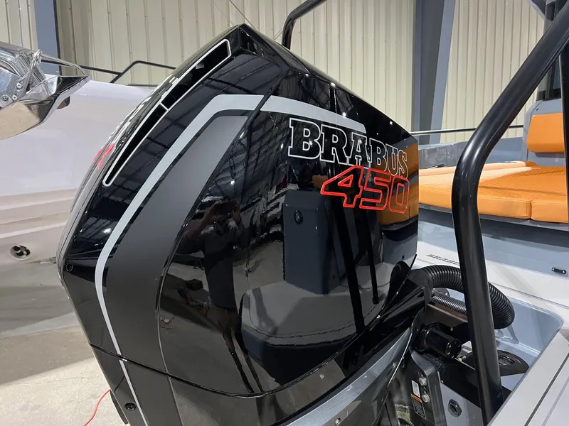 Slide: The Image of 2024 BRABUS Shadow 900 XC Cross Cabin with powerful 450 engine detail. - 25