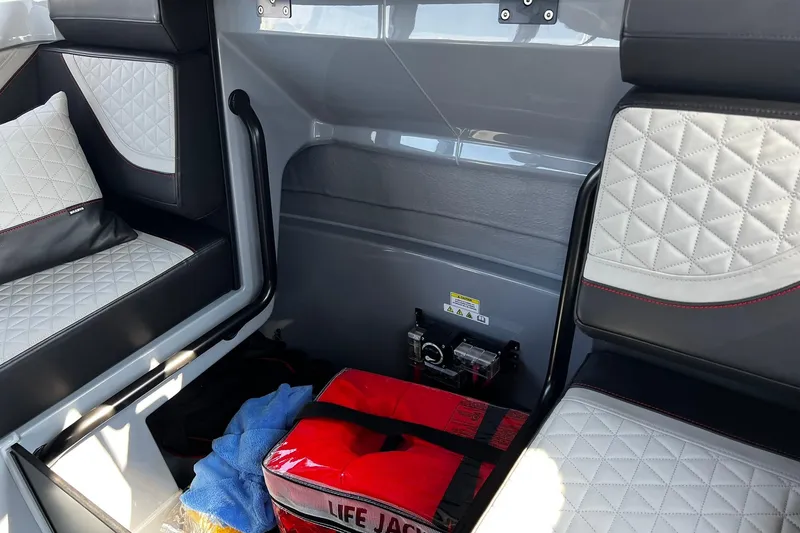 Slide: The Image of 2024 BRABUS Shadow 900 XC Cross Cabin interior with quilted seats and life jacket. - 27