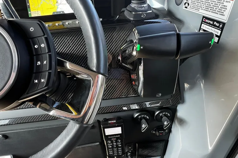 Slide: The Image of 2024 BRABUS Shadow 900 XC Cross Cabin dashboard with steering wheel and controls. - 34