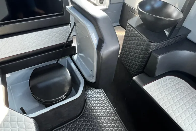 Slide: The Image of 2024 BRABUS Shadow 900 XC Cross Cabin interior with quilted seats and modern amenities. - 42