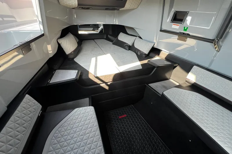 Slide: The Image of 2024 BRABUS Shadow 900 XC Cross Cabin interior with modern seating and sleek design. - 44