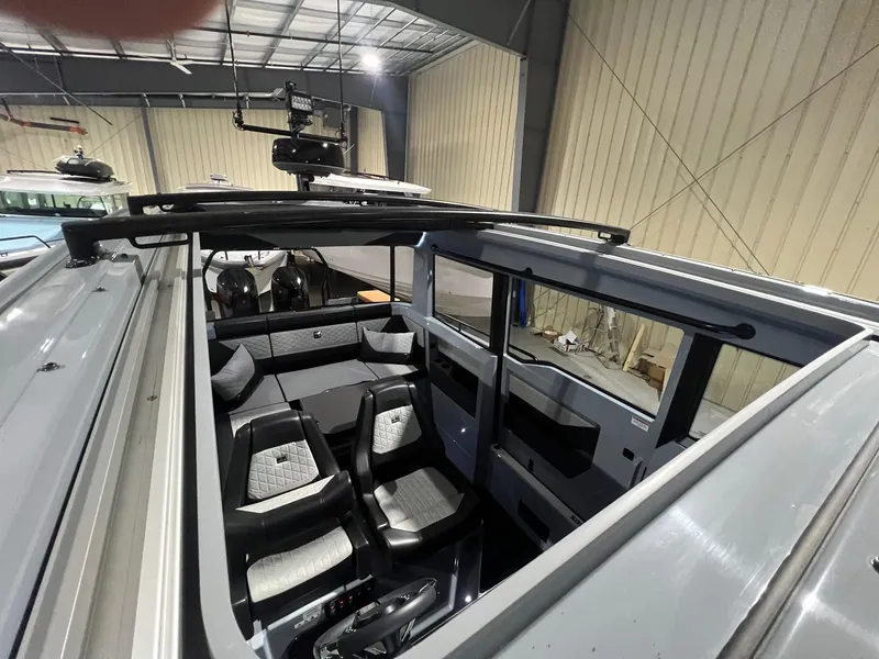 Slide: The Image of 2024 BRABUS Shadow 900 XC Cross Cabin interior with modern seating and sleek design. - 46