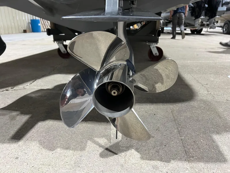 Slide: The Image of Close-up of a 2024 BRABUS Shadow 900 XC Cross Cabin propeller in a workshop setting. - 49