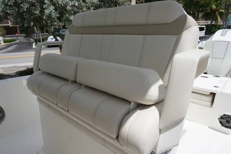 Slide: The Image of 2026 Boston Whaler 280 Dauntless boat seat, featuring luxurious beige upholstery. - 23