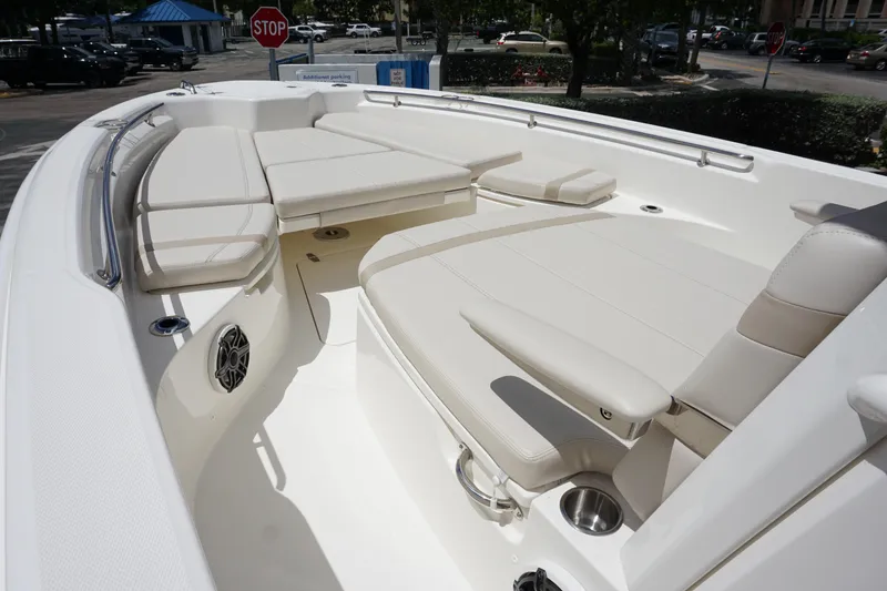 Slide: The Image of 2026 Boston Whaler 280 Dauntless boat interior with spacious seating and modern design. - 26