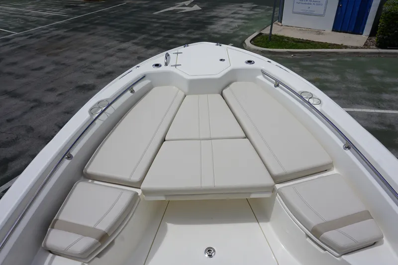 Slide: The Image of 2026 Boston Whaler 280 Dauntless boat with spacious bow seating and sleek design. - 28