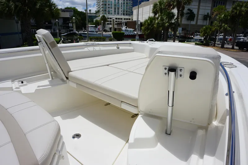 Slide: The Image of 2026 Boston Whaler 280 Dauntless boat interior with white seating and modern design. - 29