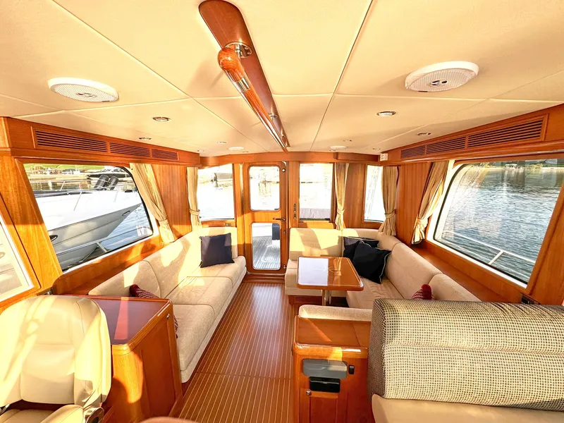 Slide: The Image of Luxurious interior of 2014 Grand Banks 46 Eastbay FB yacht with elegant wood finishes. - 29