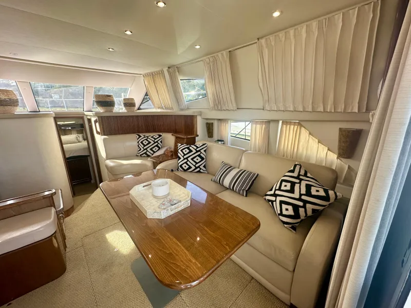 Slide: The Image of Luxurious interior of 2007 Carver 35 Super Sport yacht with elegant seating and decor. - 18