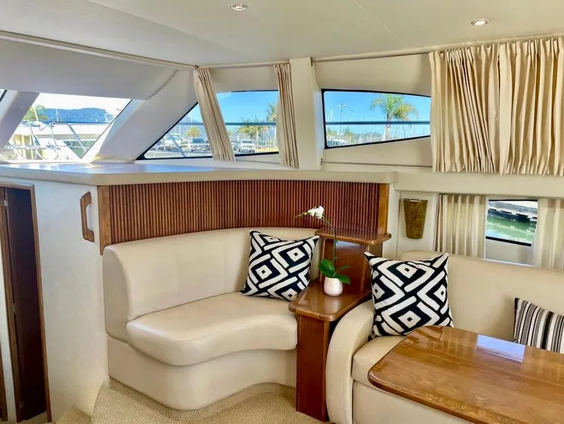 Slide: The Image of Interior of 2007 Carver 35 Super Sport yacht with elegant seating and decor. - 20