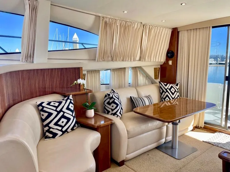 Slide: The Image of Luxurious interior of a 2007 Carver 35 Super Sport yacht with elegant seating and decor. - 22