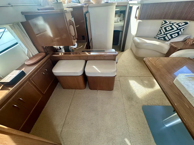 Slide: The Image of Interior of 2007 Carver 35 Super Sport yacht with seating and wooden cabinetry. - 24