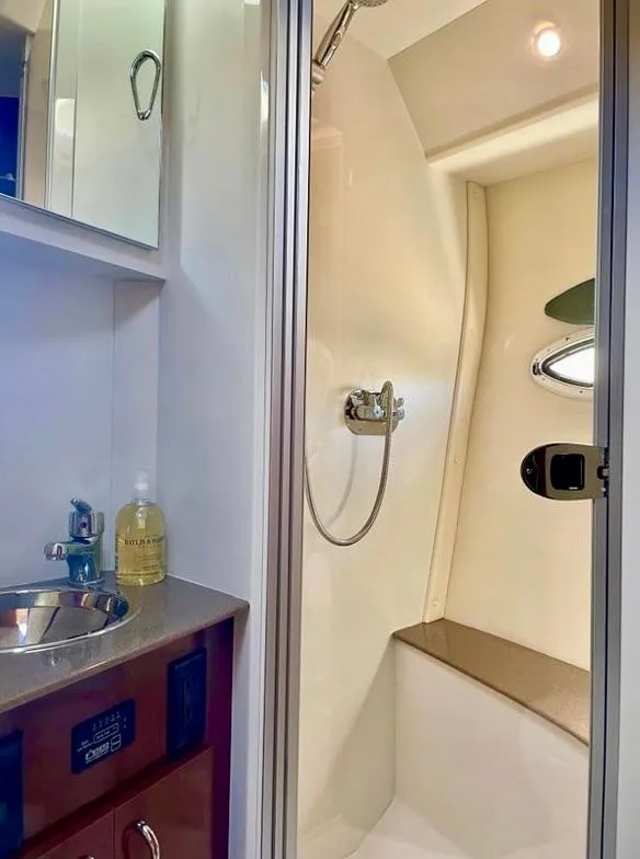 Slide: The Image of 2007 Carver 35 Super Sport yacht bathroom with shower and sink. - 34