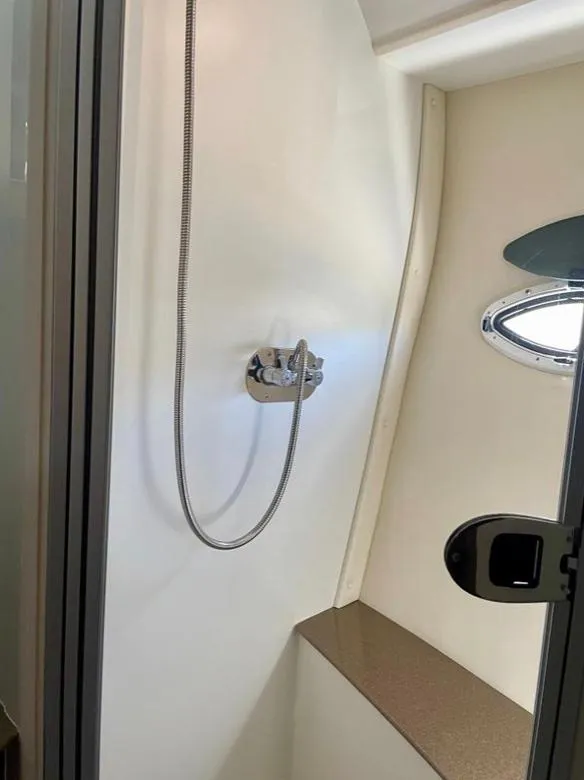 Slide: The Image of Shower area inside a 2007 Carver 35 Super Sport boat. - 37