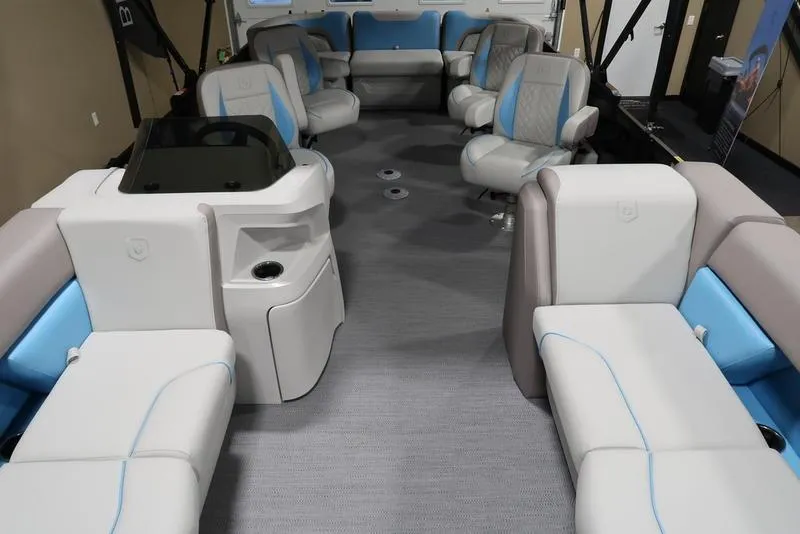Slide: The Image of Interior of 2025 Sweetwater SW 2286 QS pontoon boat with plush seating and modern design. - 13