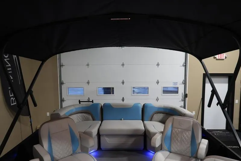 Slide: The Image of Interior of 2025 Sweetwater SW 2286 QS pontoon boat with plush seating. - 18