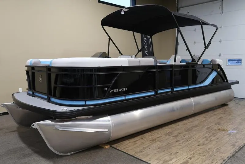 Slide: The Image of 2025 Sweetwater SW 2286 QS pontoon boat with canopy in showroom. - 3