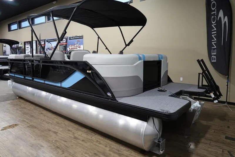 Slide: The Image of 2025 Sweetwater SW 2286 QS pontoon boat with canopy in showroom. - 5