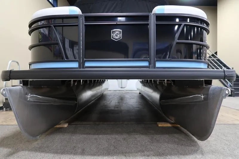 Slide: The Image of 2025 Sweetwater SW 2286 QS pontoon boat, front view, sleek design, black and blue accents. - 7