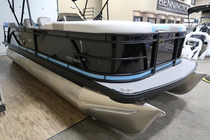 Slide: The Image of 2025 Sweetwater SW 2286 QS pontoon boat displayed indoors. - 8