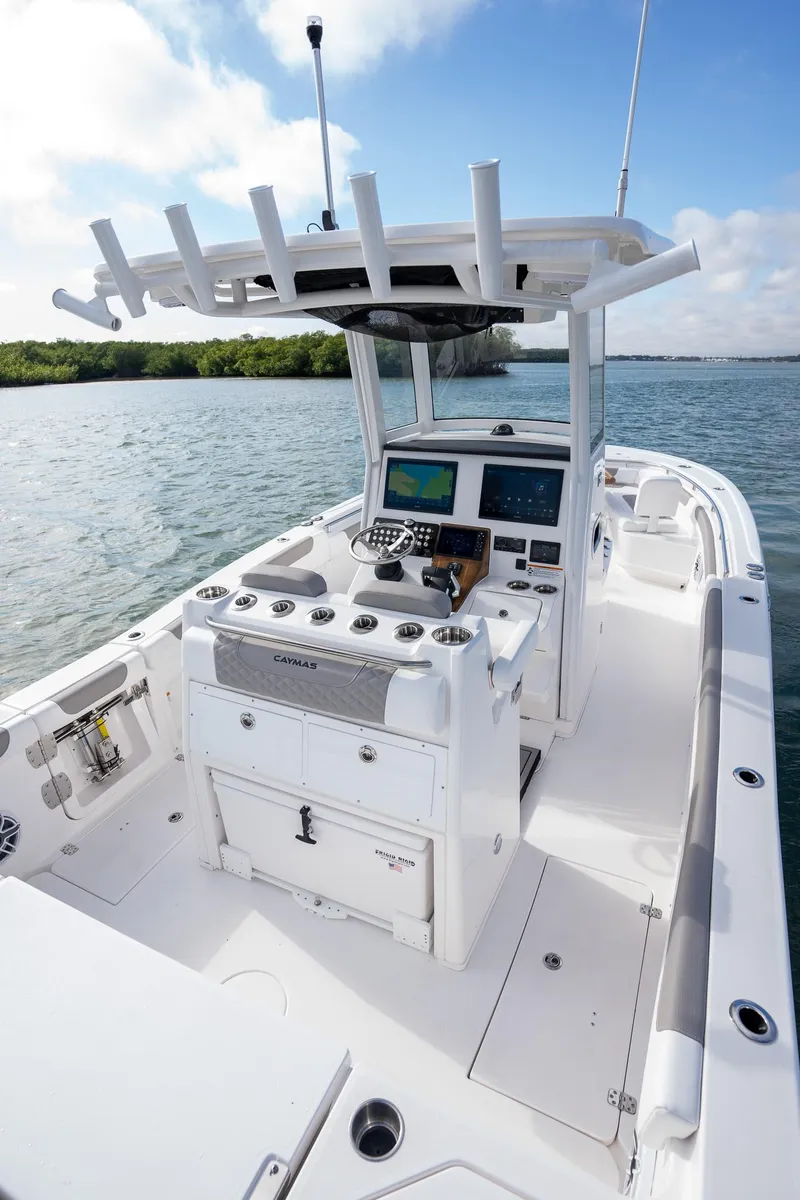 Slide: The Image of 2025 Caymas 291 boat with advanced navigation system on open water. - 24