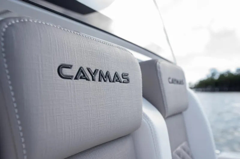 Slide: The Image of 2025 Caymas 291 boat seats with logo, close-up view. - 32