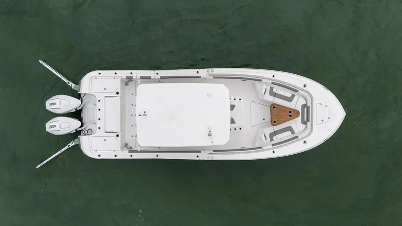 Slide: The Image of Aerial view of 2025 Caymas 291 boat on green water. - 5