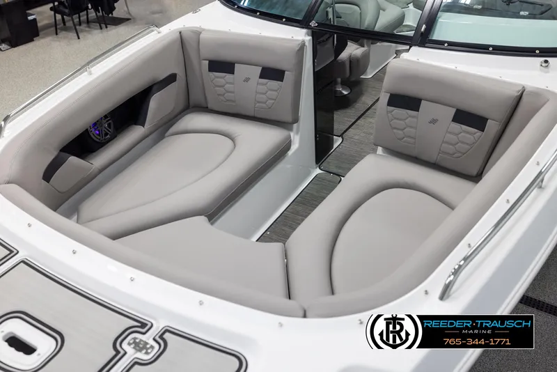 Slide: The Image of 2025 Four Winns HD5 boat interior with luxurious seating and modern design. - 10