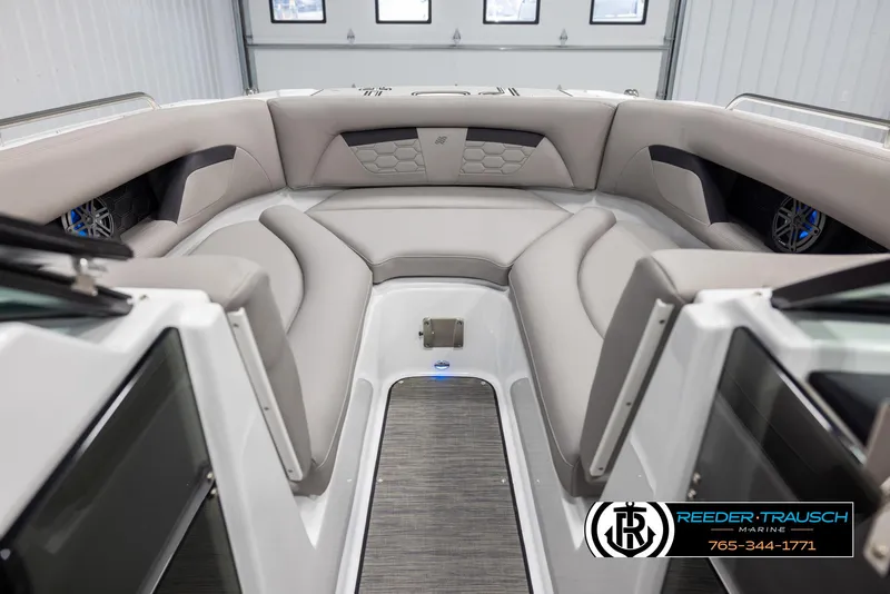 Slide: The Image of 2025 Four Winns HD5 boat interior with luxurious seating and modern design. - 16
