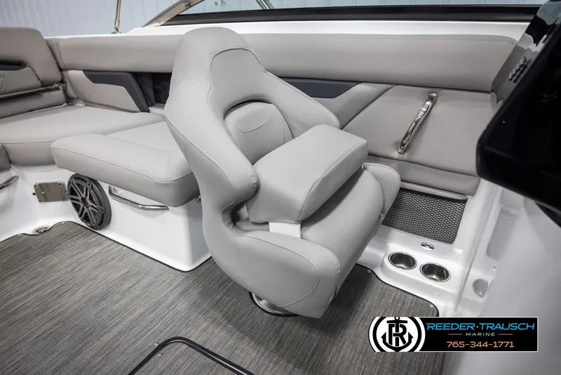Slide: The Image of 2025 Four Winns HD5 boat interior with gray seating and modern design. - 24