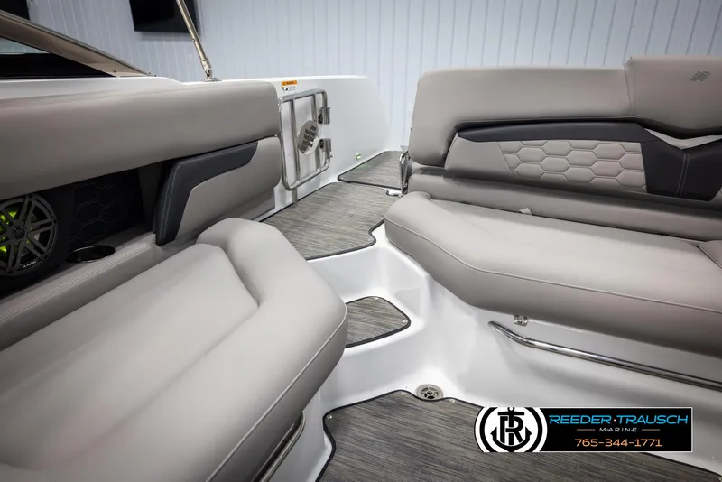 Slide: The Image of Interior of 2025 Four Winns HD5 boat with luxurious seating and modern design. - 29