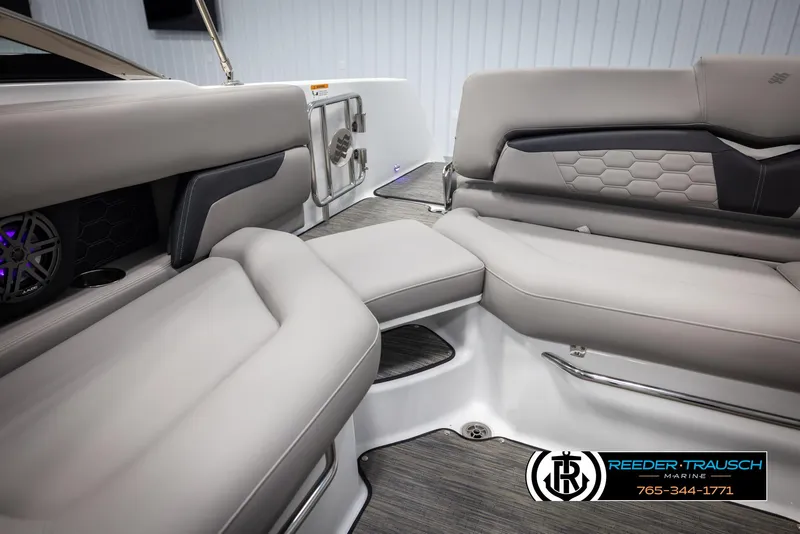 Slide: The Image of 2025 Four Winns HD5 boat interior with luxurious seating and modern design. - 30