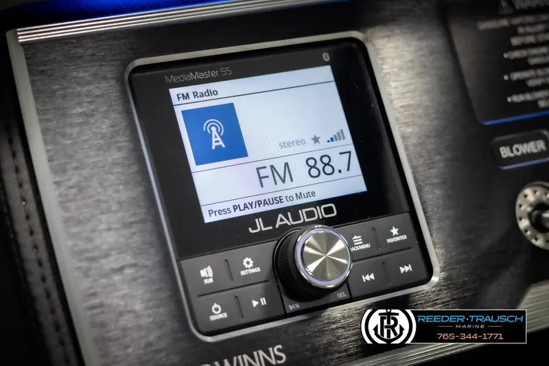 Slide: The Image of 2025 Four Winns HD5 boat stereo system displaying FM radio at 88.7 frequency. - 37