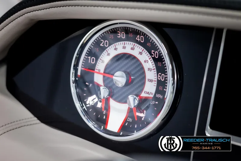 Slide: The Image of Close-up of 2025 Four Winns HD5 speedometer with Reeder-Trausch Marine branding. - 39
