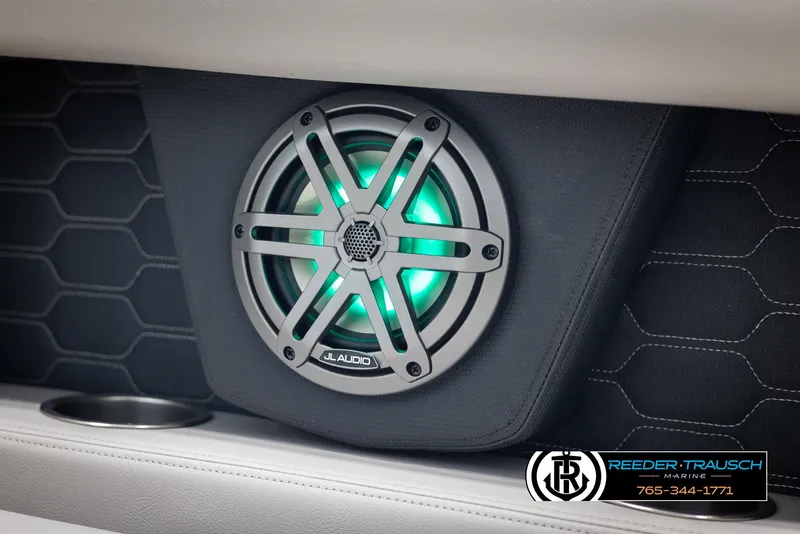 Slide: The Image of Speaker with green LED light on 2025 Four Winns HD5 boat interior. - 47