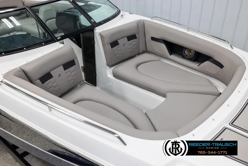 Slide: The Image of 2025 Four Winns HD5 boat interior with gray seating and modern design. - 9