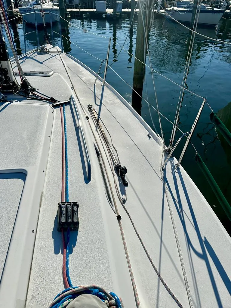 Slide: The Image of 2006 J Boats J/92S sailboat deck with rigging at marina. - 16