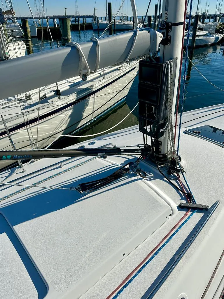 Slide: The Image of 2006 J Boats J/92S sailboat deck with rigging and mast in marina. - 24