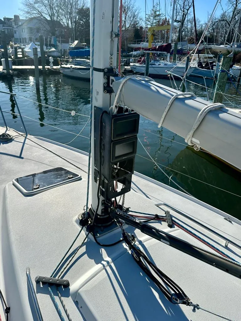 Slide: The Image of 2006 J Boats J/92S sailboat deck with mast and rigging in marina. - 25