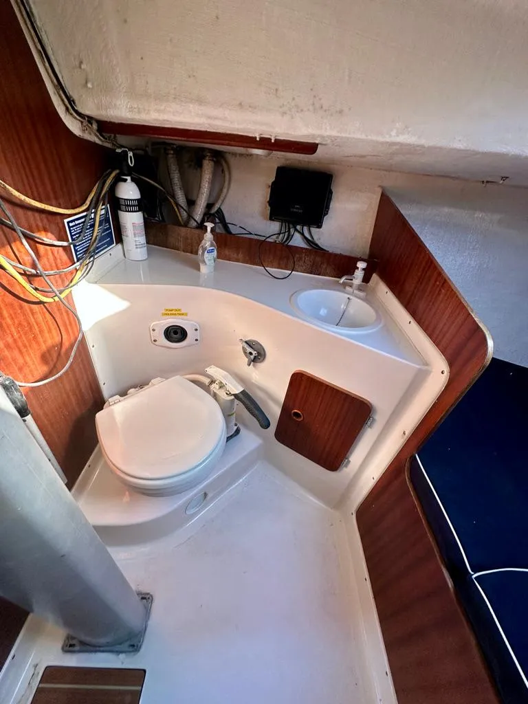 Slide: The Image of 2006 J Boats J/92S sailboat interior bathroom with toilet and sink. - 35