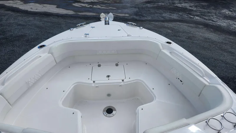 Slide: The Image of 2023 Edgewater 280 CX boat interior with spacious seating and storage. - 46