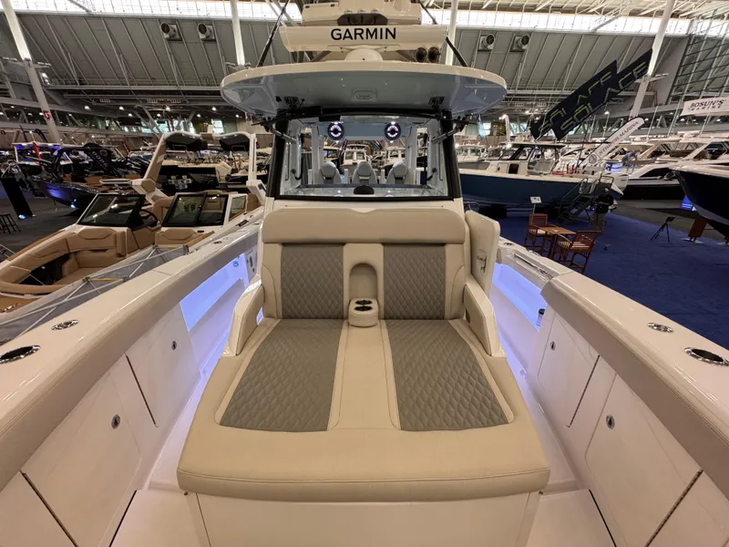 Slide: The Image of 2025 Solace 37 CS boat interior with Garmin electronics at a boat show. - 16