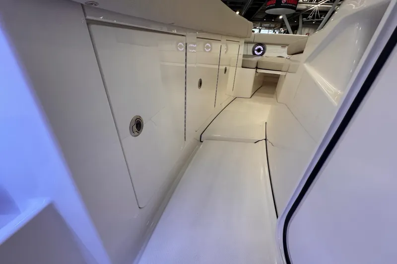 Slide: The Image of 2025 Solace 37 CS boat interior with sleek white design and modern features. - 20