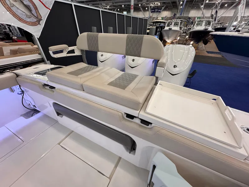 Slide: The Image of Luxury seating on 2025 Solace 37 CS boat at a marine exhibition. - 3