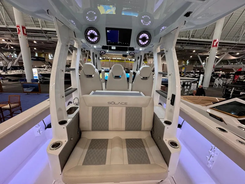 Slide: The Image of 2025 Solace 37 CS boat interior with modern seating and advanced controls. - 4