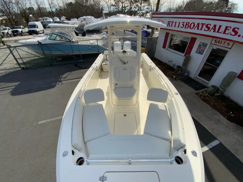Slide: The Image of 2024 Cobia 240 Center Console boat at dealership, front view. - 22